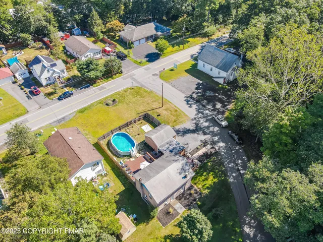 a balcony with furniture and wooden floor