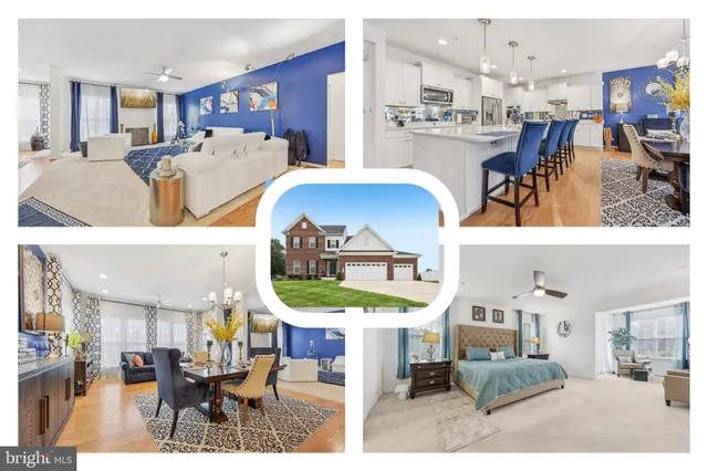 a living room with furniture and a dining table with kitchen view