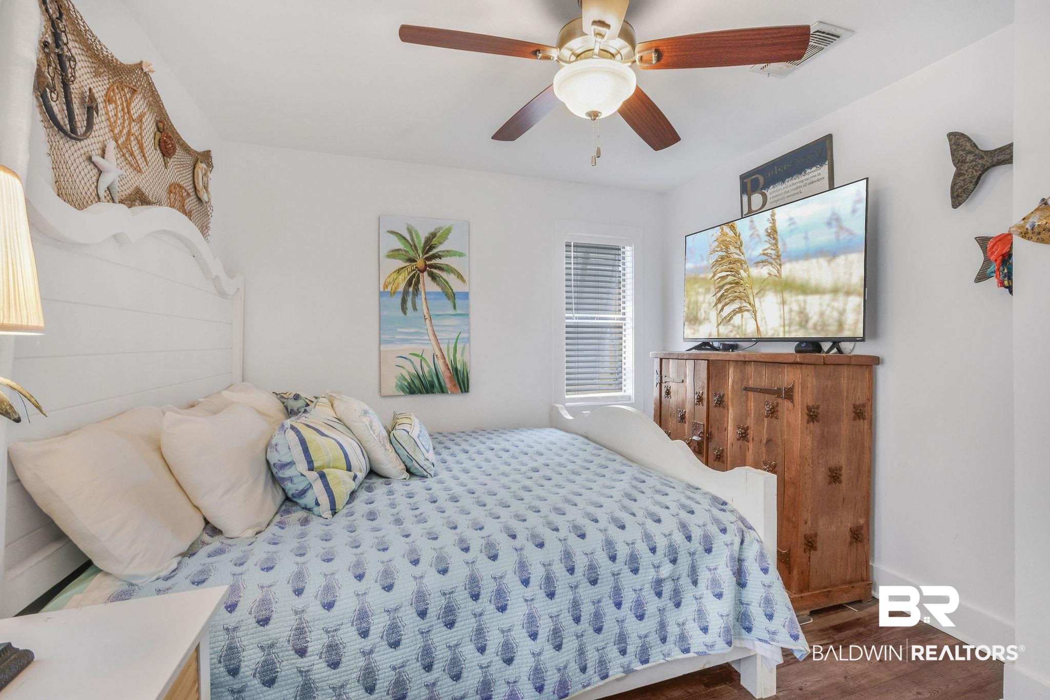 32130 River Road Orange Beach, AL 36561 - Photo 17 of 51 Bedroom with wood finished floors and a ceiling fan