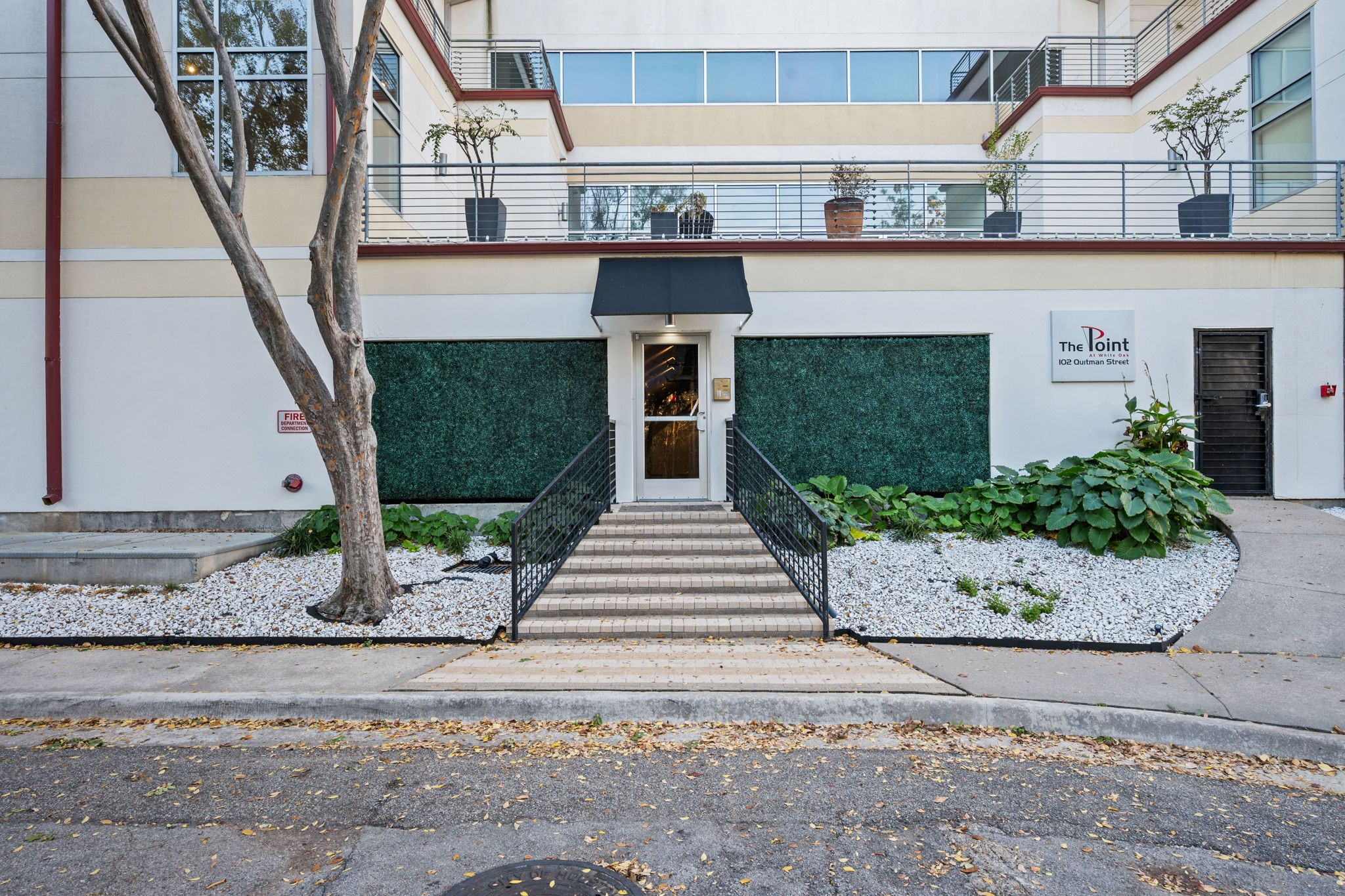 a front view of a house with garage