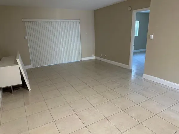 an empty room with a fireplace