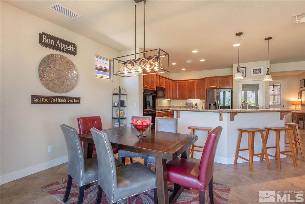 1149 Dutch Hollow Trail Reno, NV 89523 - Photo 11 of 38 a view of a dining room and livingroom