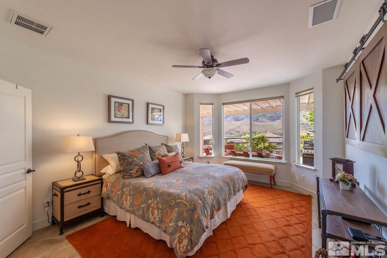 1149 Dutch Hollow Trail Reno, NV 89523 - Photo 20 of 38 a bed room with a bed and a tv