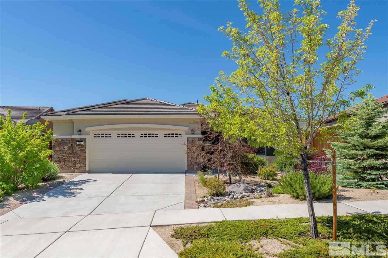 1149 Dutch Hollow Trail Reno, NV 89523 - Photo 2 of 38 a front view of a house with a garden