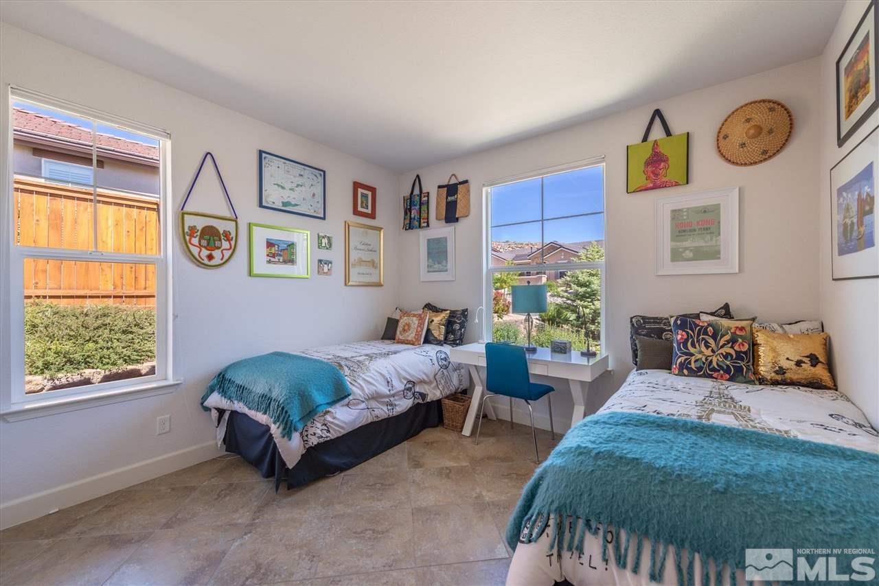 1149 Dutch Hollow Trail Reno, NV 89523 - Photo 25 of 38 a bedroom with a bed and a window