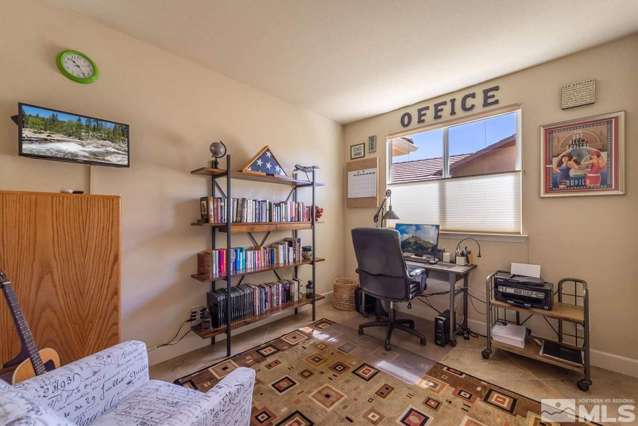1149 Dutch Hollow Trail Reno, NV 89523 - Photo 27 of 38 a view of a workspace with furniture and a window
