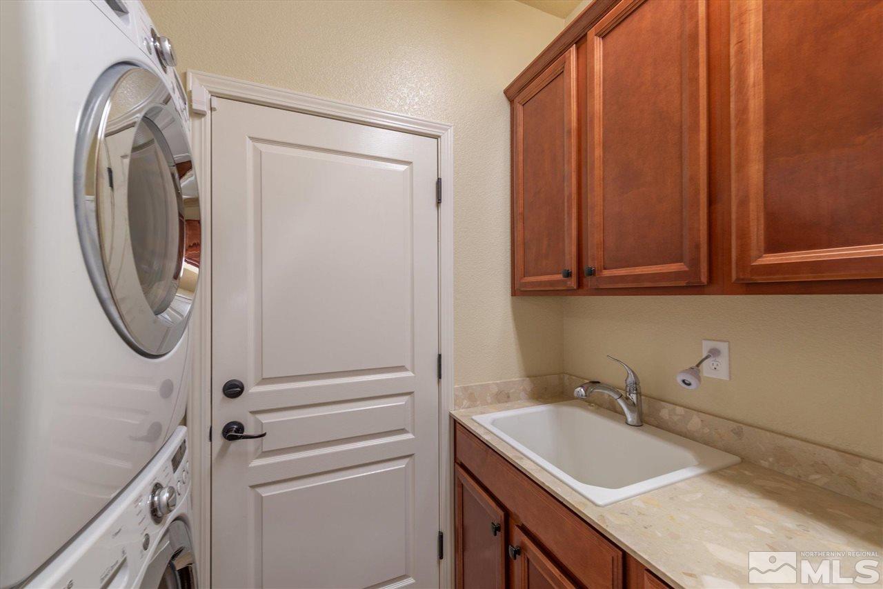 1149 Dutch Hollow Trail Reno, NV 89523 - Photo 28 of 38 a bathroom with a sink and a mirror