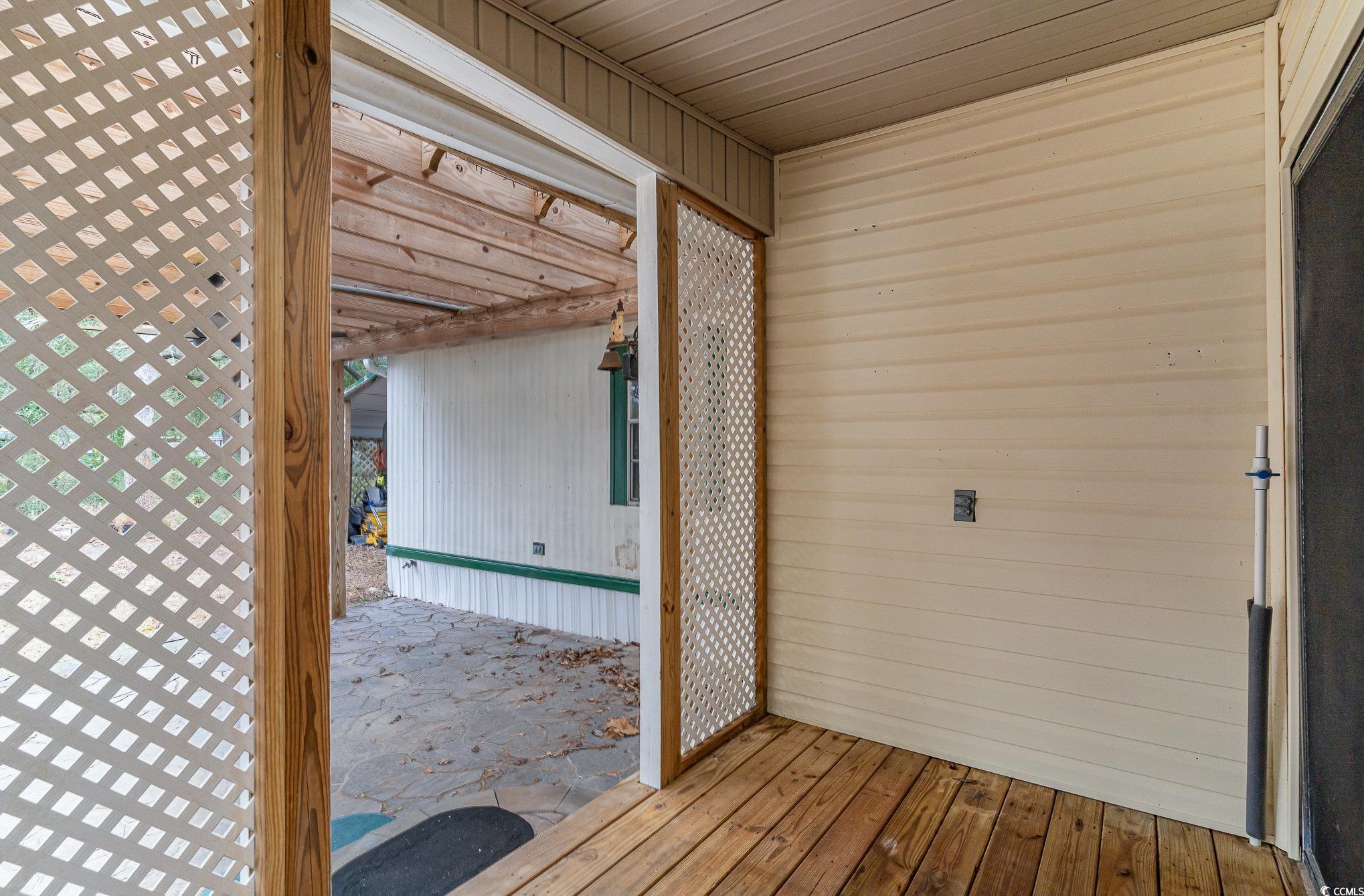 410 Ponderosa Drive Murrells Inlet, SC 29576 - Photo 20 of 27 View of wooden terrace