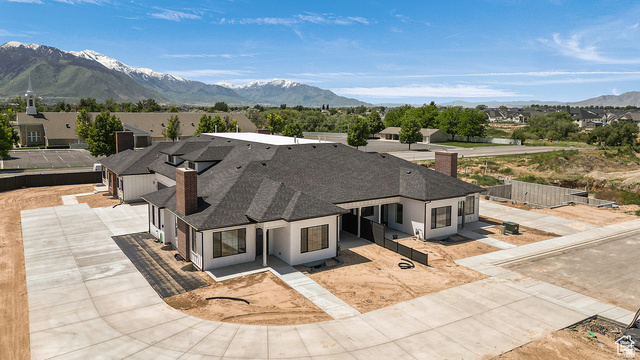 1631 West Century Lane, Unit C Mapleton, UT 84664 - Photo 29 of 31 Contemporary multi-unit property with a dark shingle roof and white siding