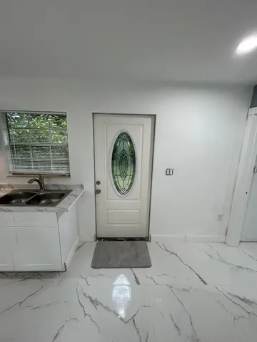 a view of a beach with a ocean view