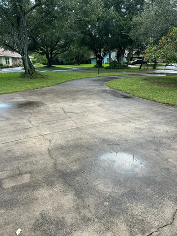 a backyard of a house with lots of green space