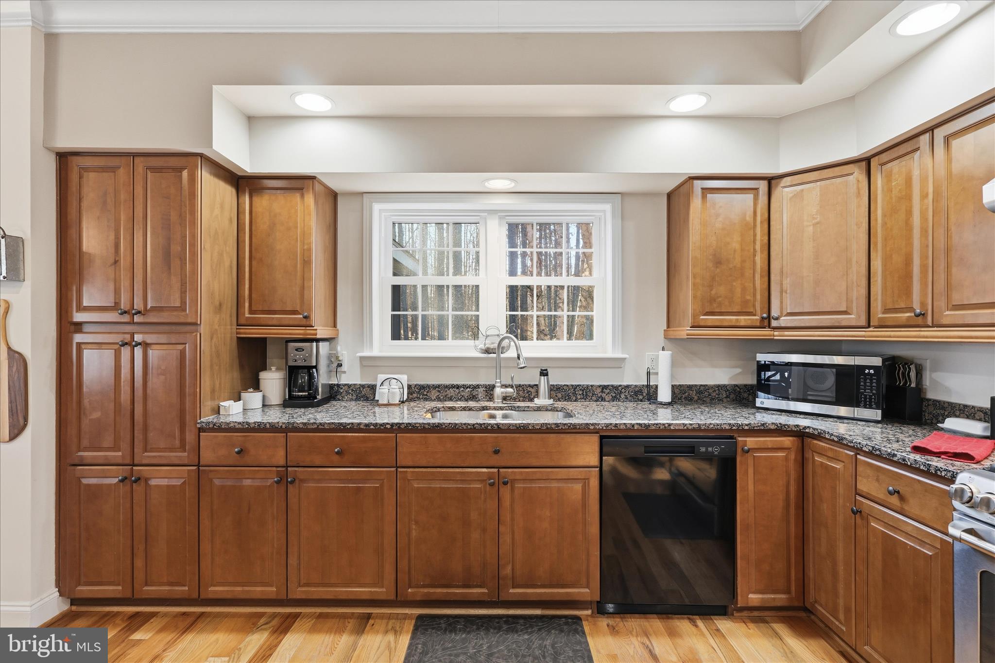 157 Roderick Place Mineral, VA 23117 - Photo 15 of 69 a kitchen with stainless steel appliances granite countertop a sink stove and refrigerator