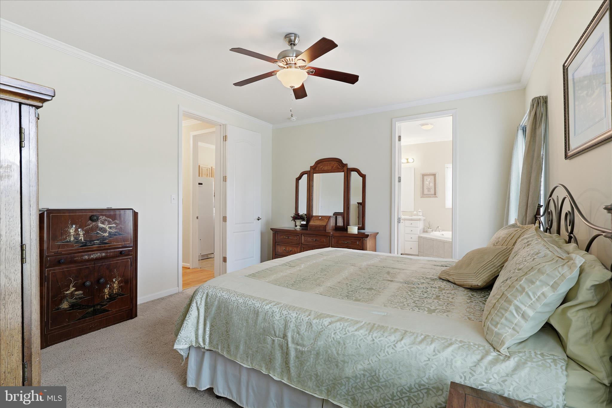 157 Roderick Place Mineral, VA 23117 - Photo 28 of 69 a bedroom with a bed and a large mirror