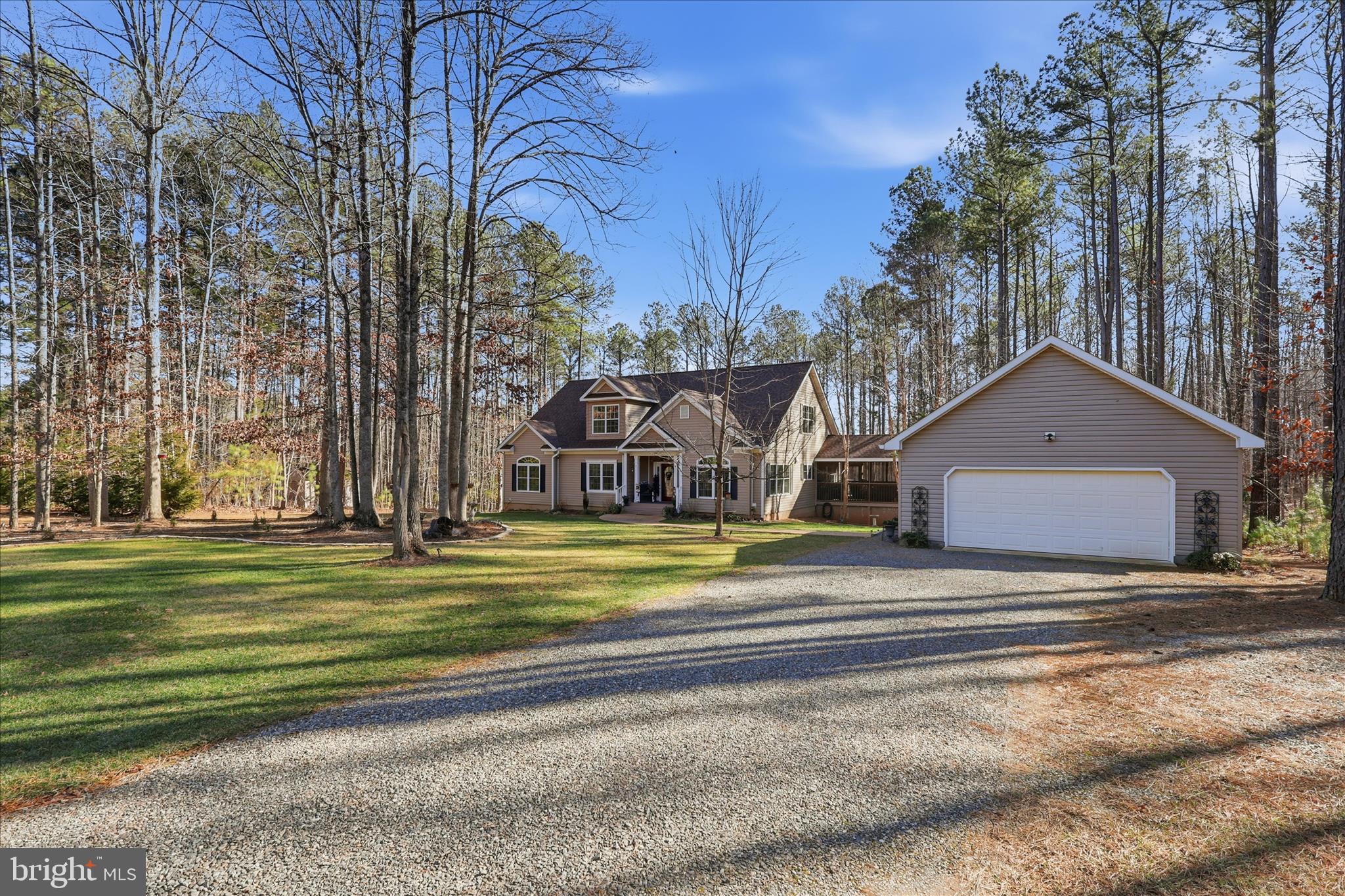 157 Roderick Place Mineral, VA 23117 - Photo 3 of 69 a front view of a house with a yard