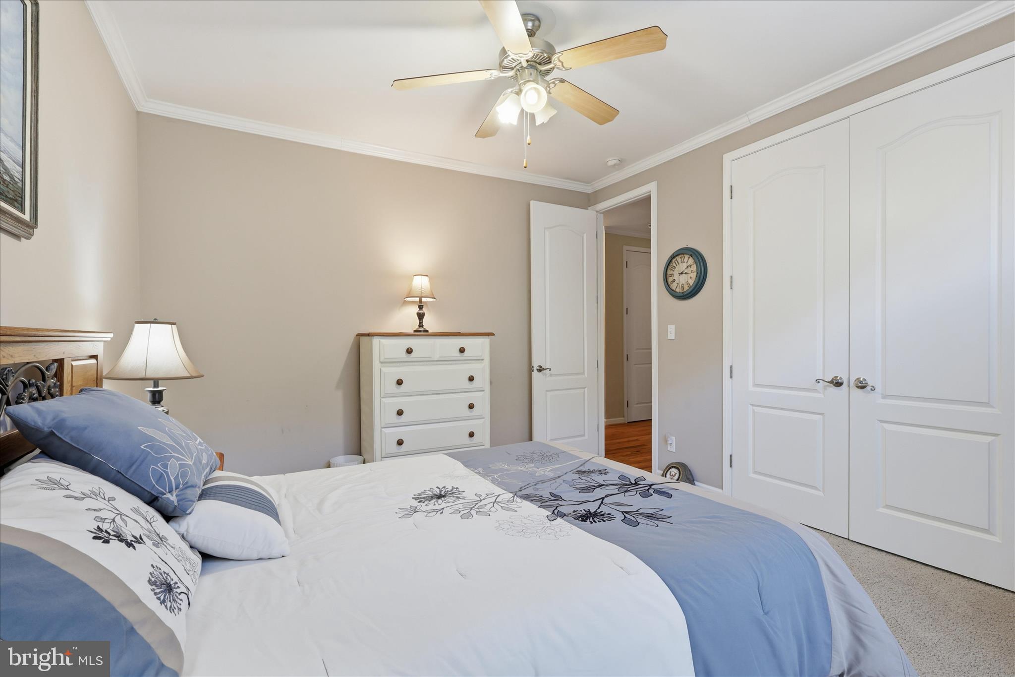 157 Roderick Place Mineral, VA 23117 - Photo 34 of 69 a bedroom with a bed and a chandelier