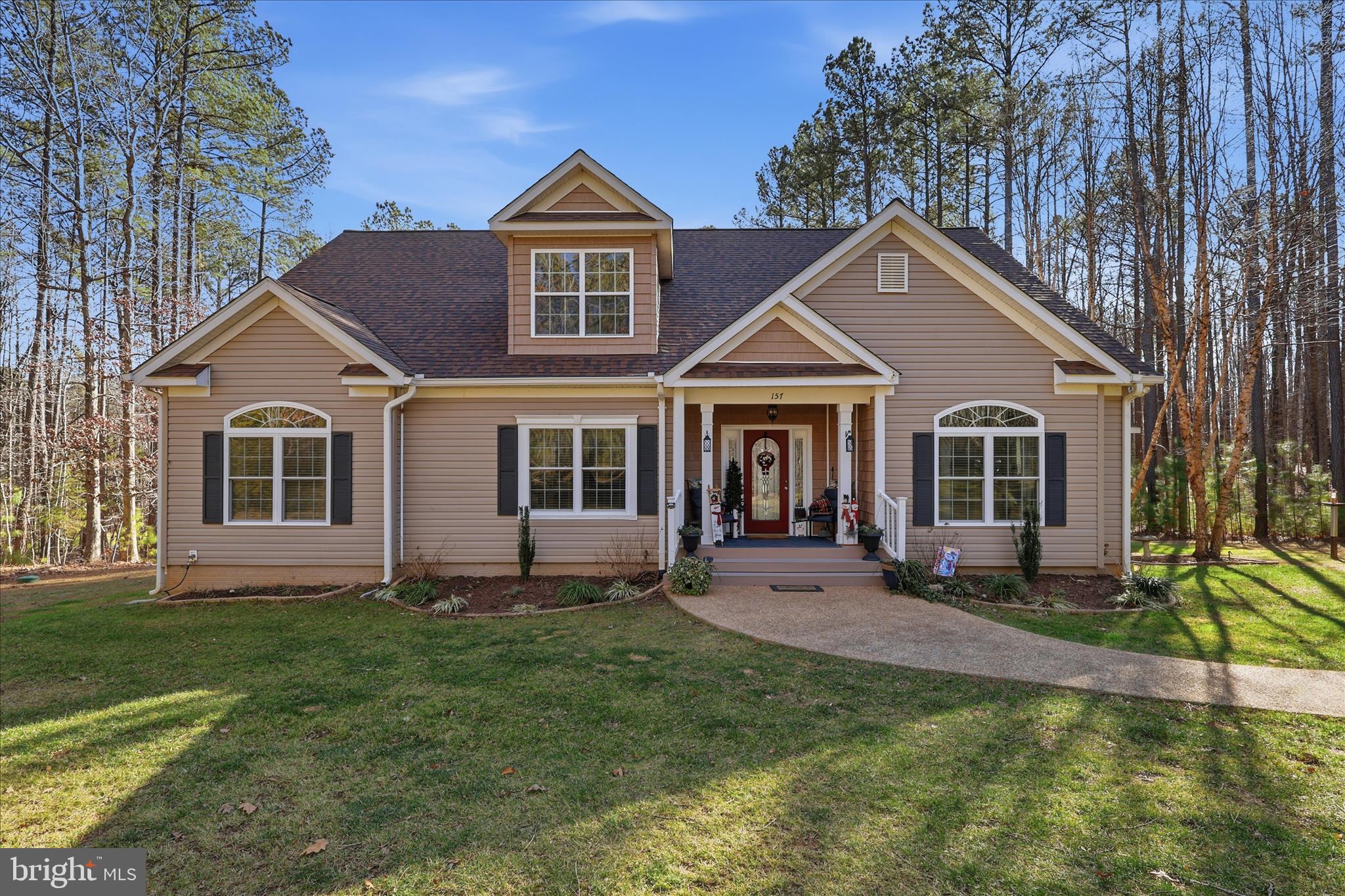 157 Roderick Place Mineral, VA 23117 - Photo 4 of 69 a front view of a house with a yard