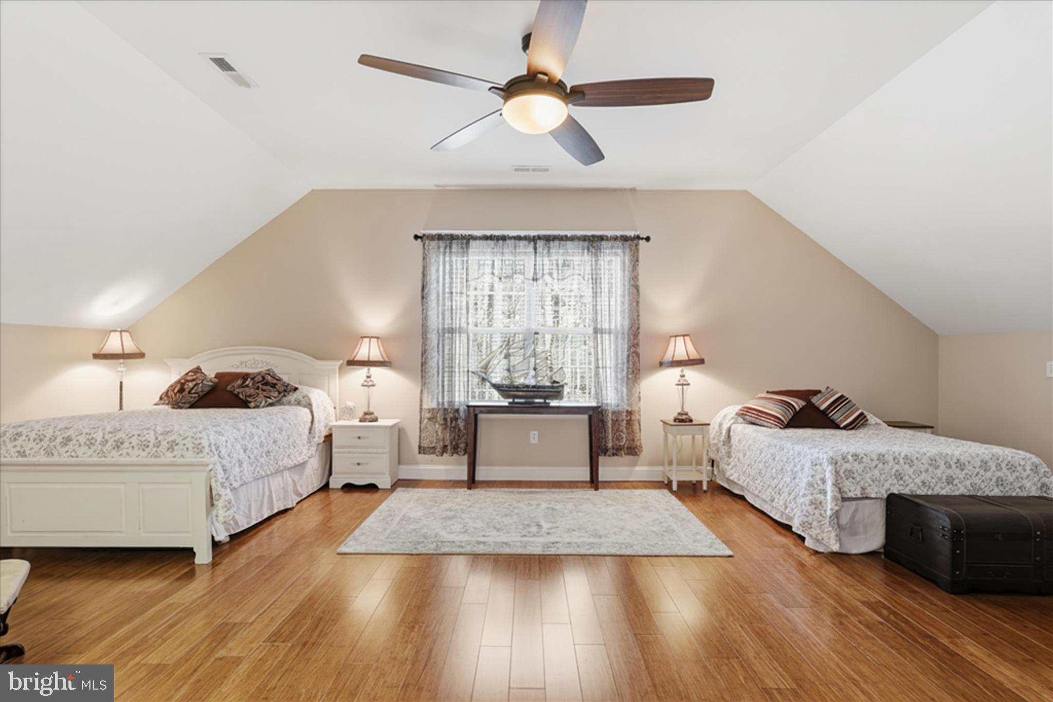 157 Roderick Place Mineral, VA 23117 - Photo 43 of 69 a spacious bedroom with a bed and a chandelier