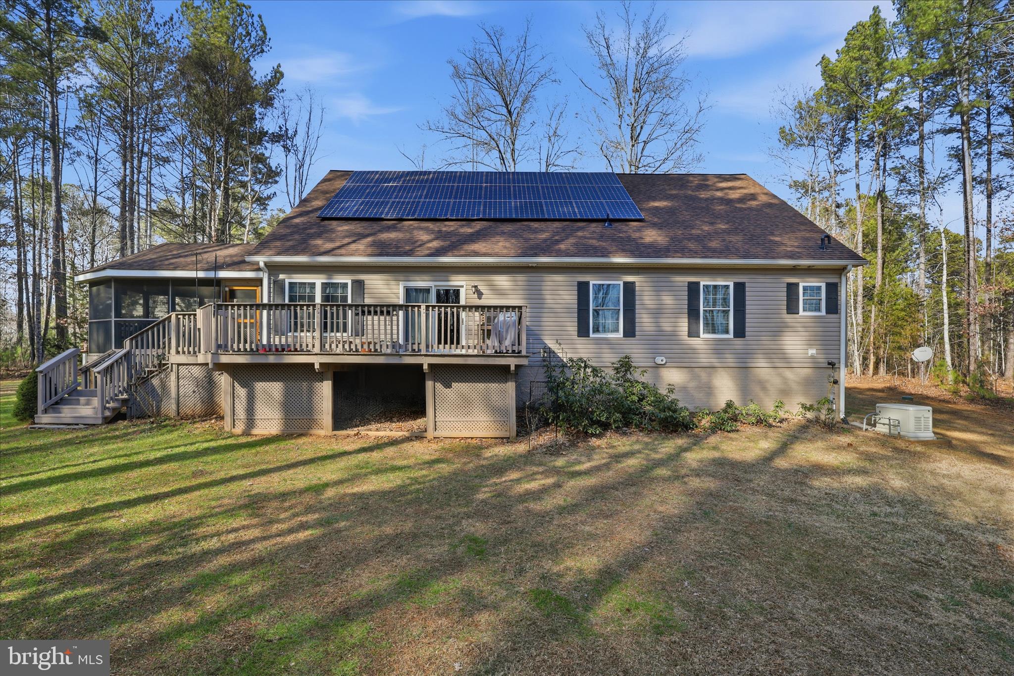 157 Roderick Place Mineral, VA 23117 - Photo 46 of 69 a view of a house with a big yard and large trees