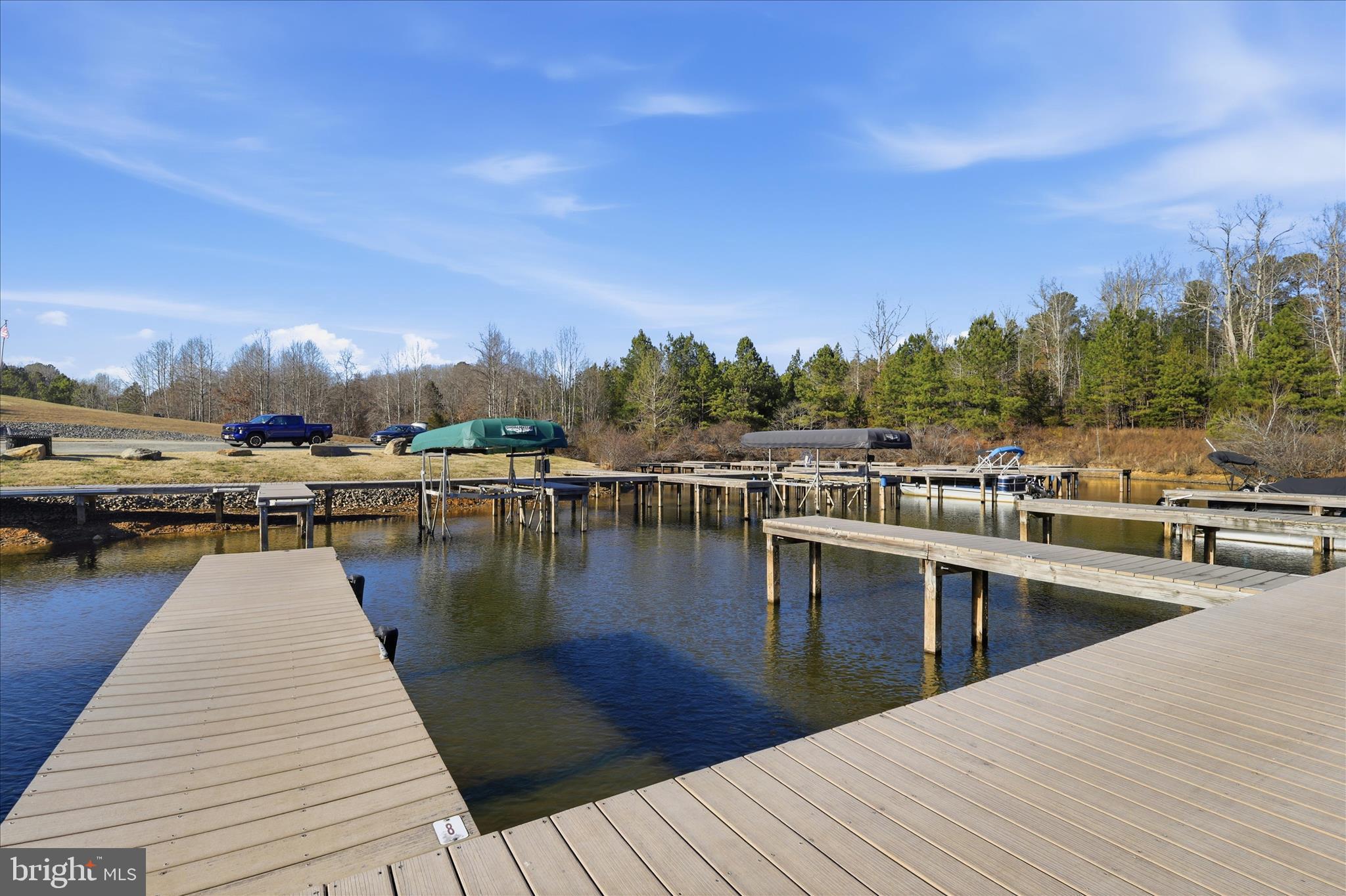 157 Roderick Place Mineral, VA 23117 - Photo 51 of 69 a view of a lake with sitting area