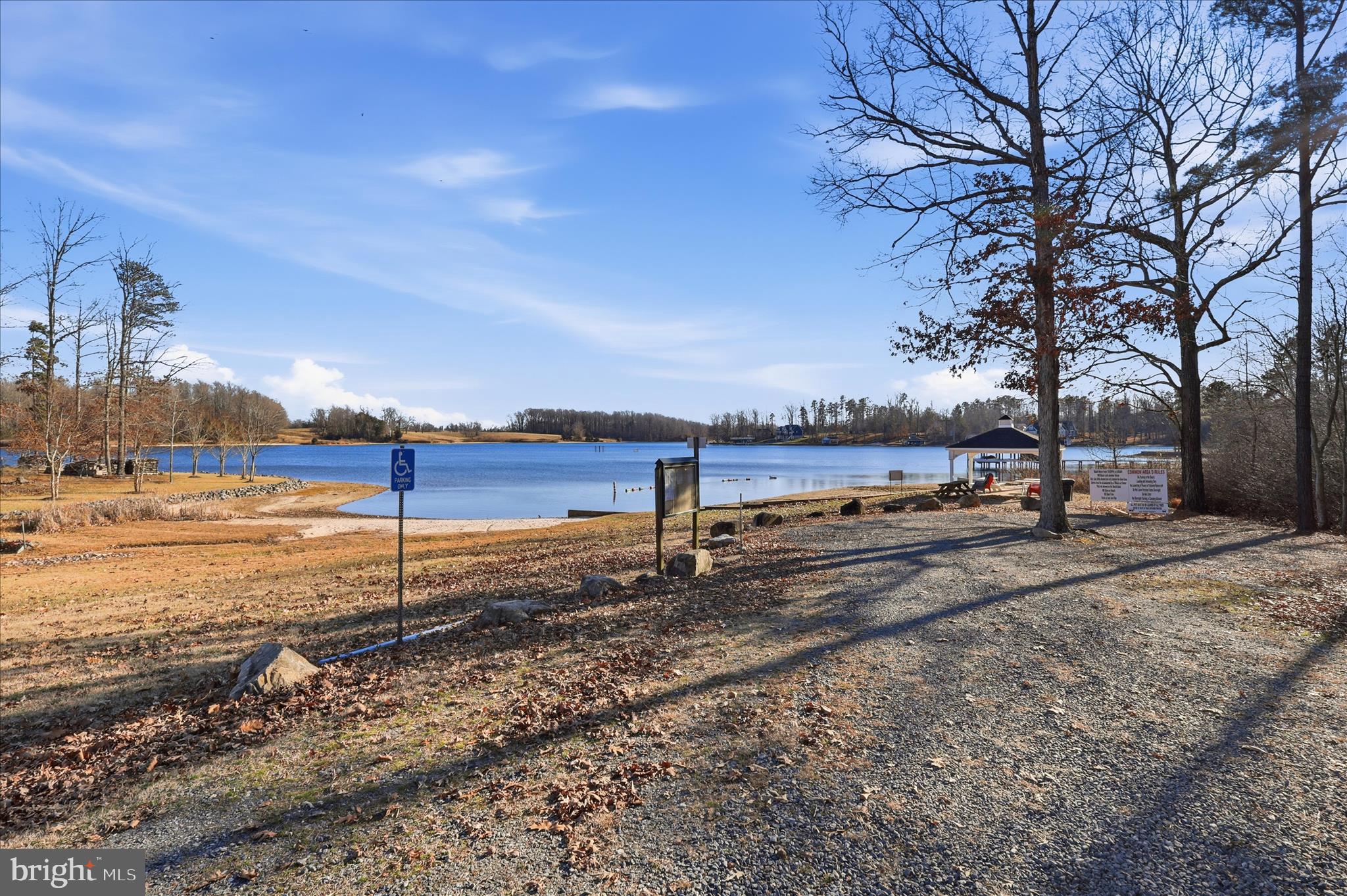 157 Roderick Place Mineral, VA 23117 - Photo 54 of 69 a view of a lake with a building in the background