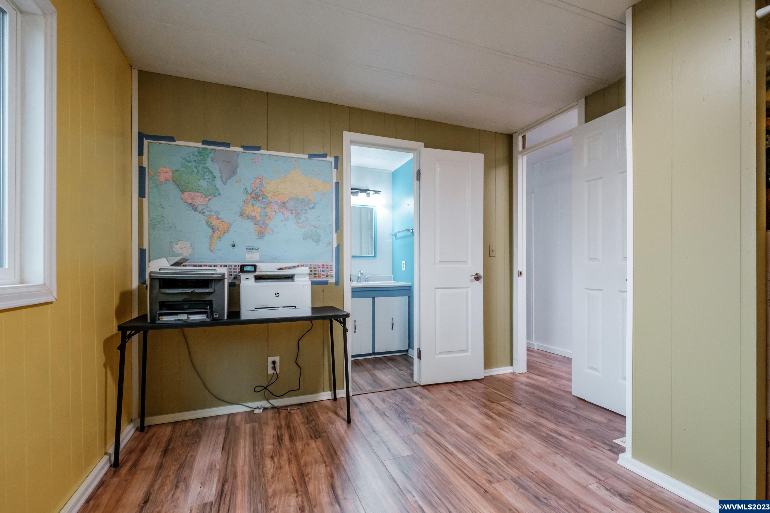 4915 Swegle Road Northeast, Unit 47 Salem, OR 97301 - Photo 25 of 36 view of a room with wooden floor and a window