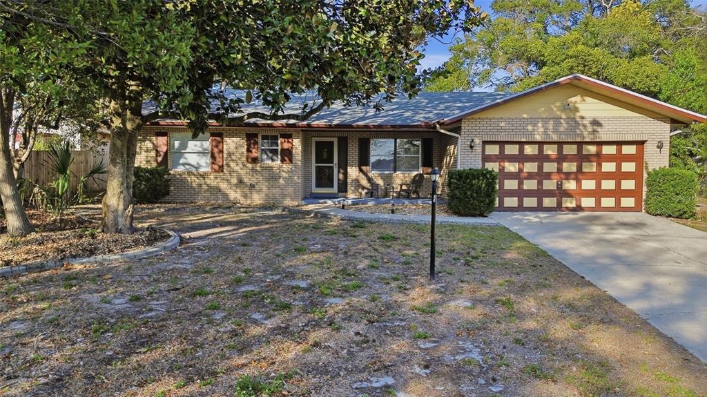 244 Angeles Road DeBary, FL 32713 - Photo 2 of 41 a view of a house with a yard