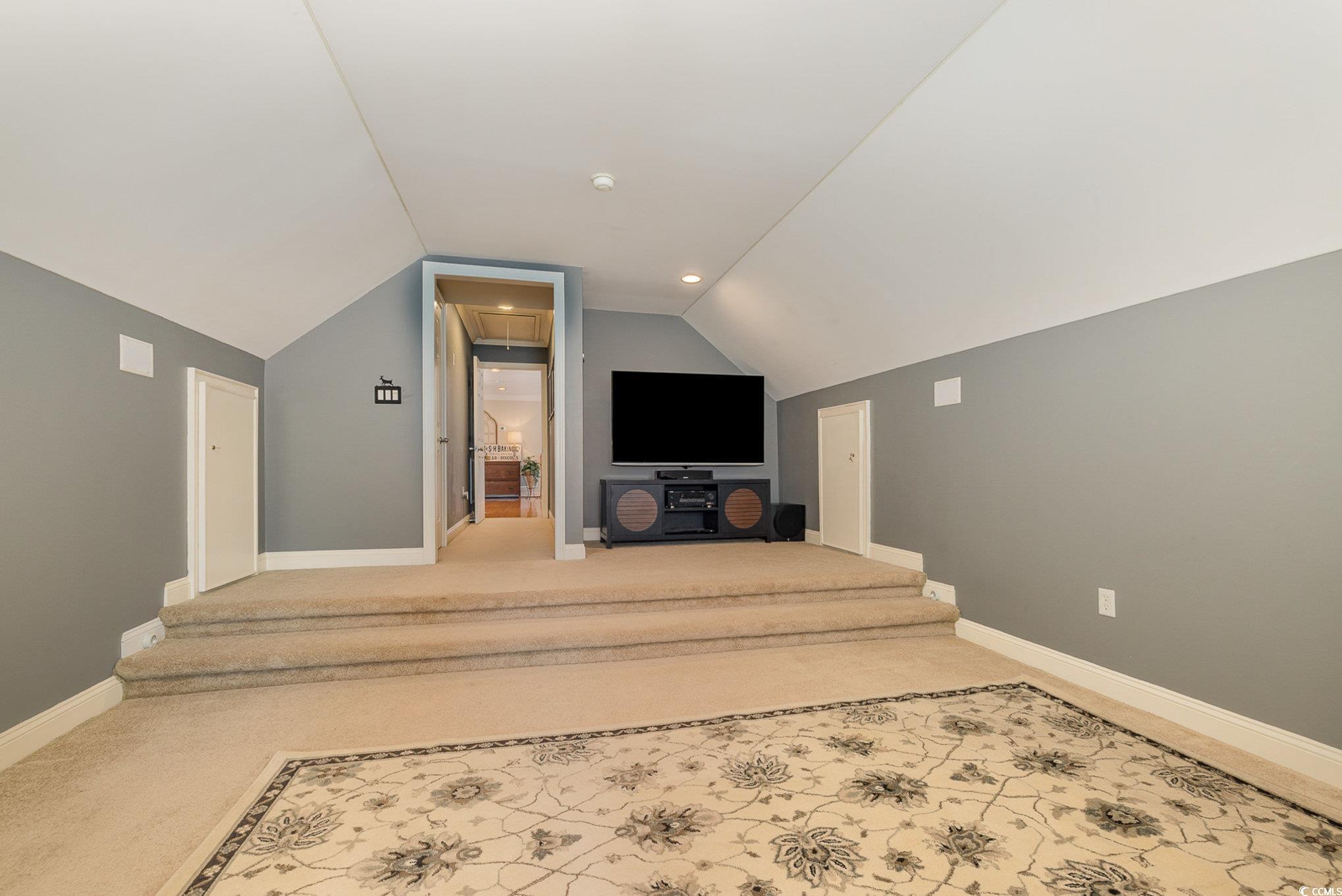 3658 Edwards Road Aynor, SC 29511 - Photo 23 of 39 Unfurnished living room with carpet and lofted ceiling