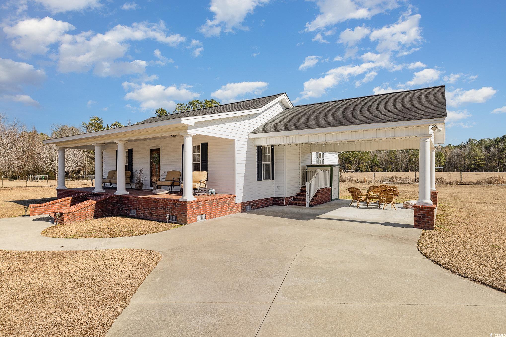 3658 Edwards Road Aynor, SC 29511 - Photo 27 of 39 View of patio featuring covered porch
