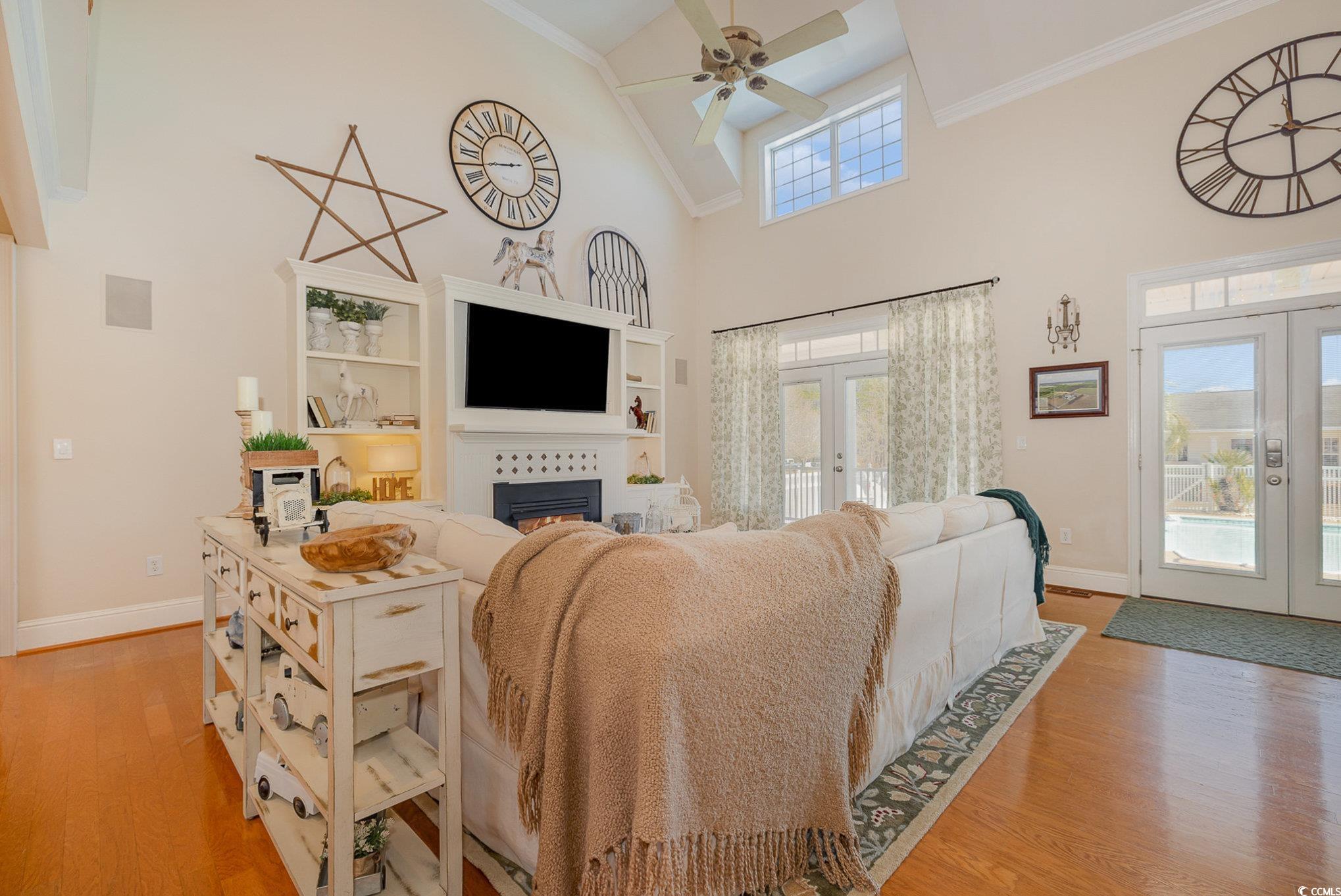 3658 Edwards Road Aynor, SC 29511 - Photo 6 of 39 Living room with french doors, light hardwood / wood-style flooring, and a wealth of natural light