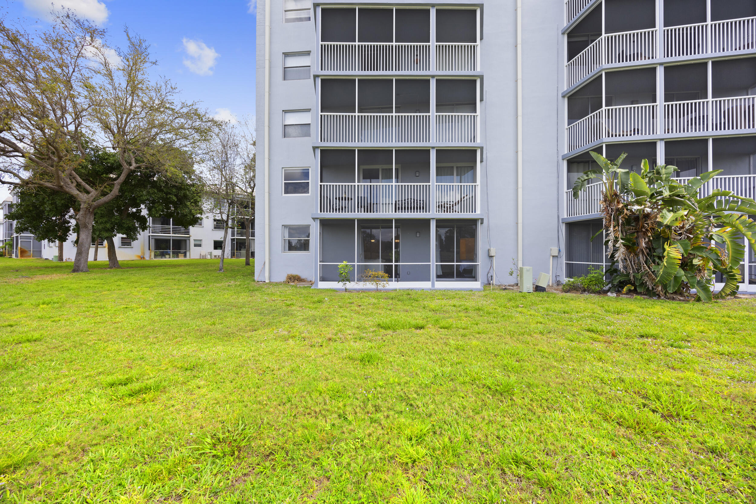 5301 Northwest 2nd Avenue, Unit 1010 Boca Raton, FL 33487 - Photo 34 of 35 Backyard Patio