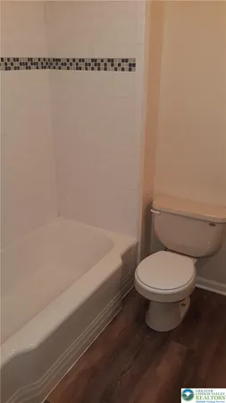 a bathroom with a sink vanity and a mirror