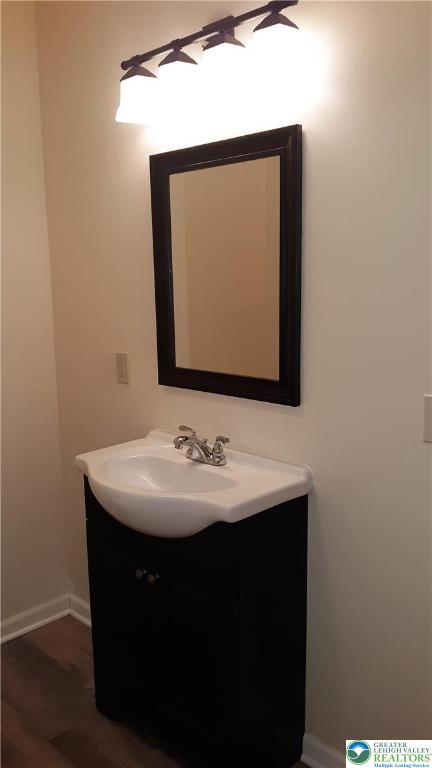 228 West 3rd Street Bethlehem, PA 18015 - Photo 5 of 5 a bathroom with a sink and a mirror