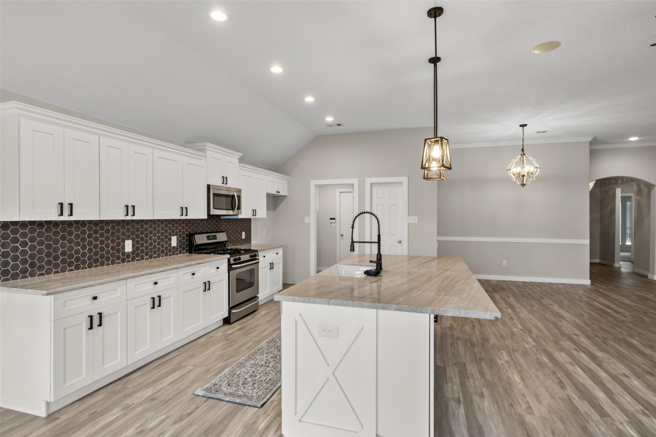 2435 Soledad Ridge Drive Spring, TX 77373 - Photo 13 of 25 Notice the backsplash and upgraded cabinet hardware.