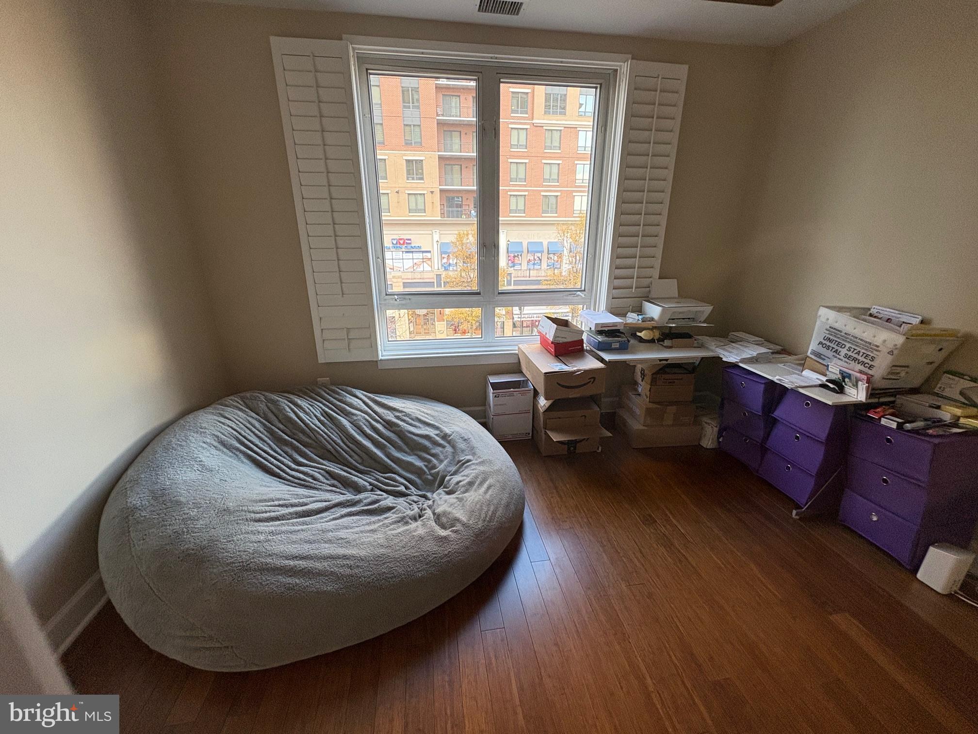 1915 Towne Centre Boulevard, Unit 309 Annapolis, MD 21401 - Photo 8 of 25 a room with furniture and window