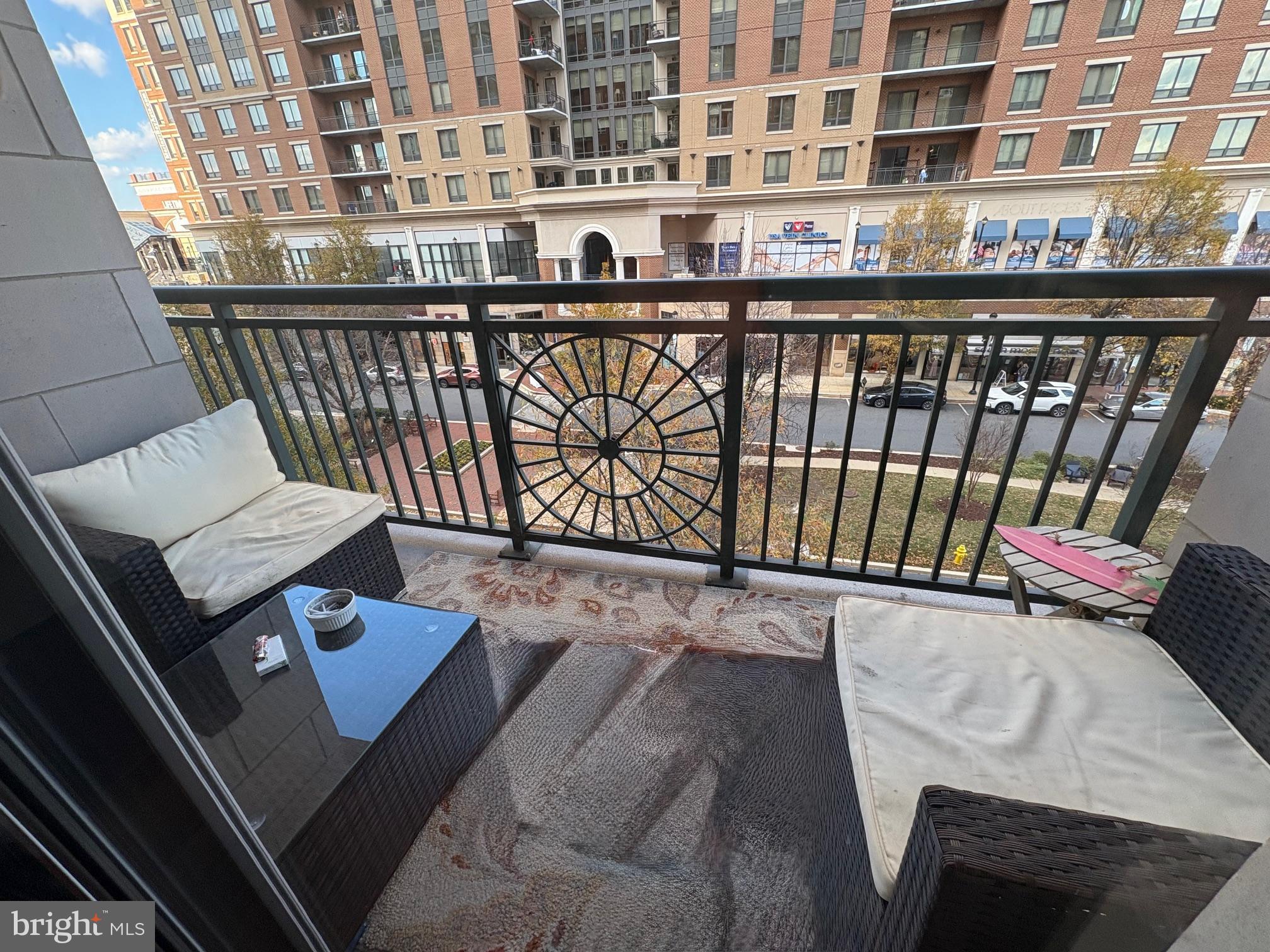 1915 Towne Centre Boulevard, Unit 309 Annapolis, MD 21401 - Photo 9 of 25 a view of a balcony with chairs