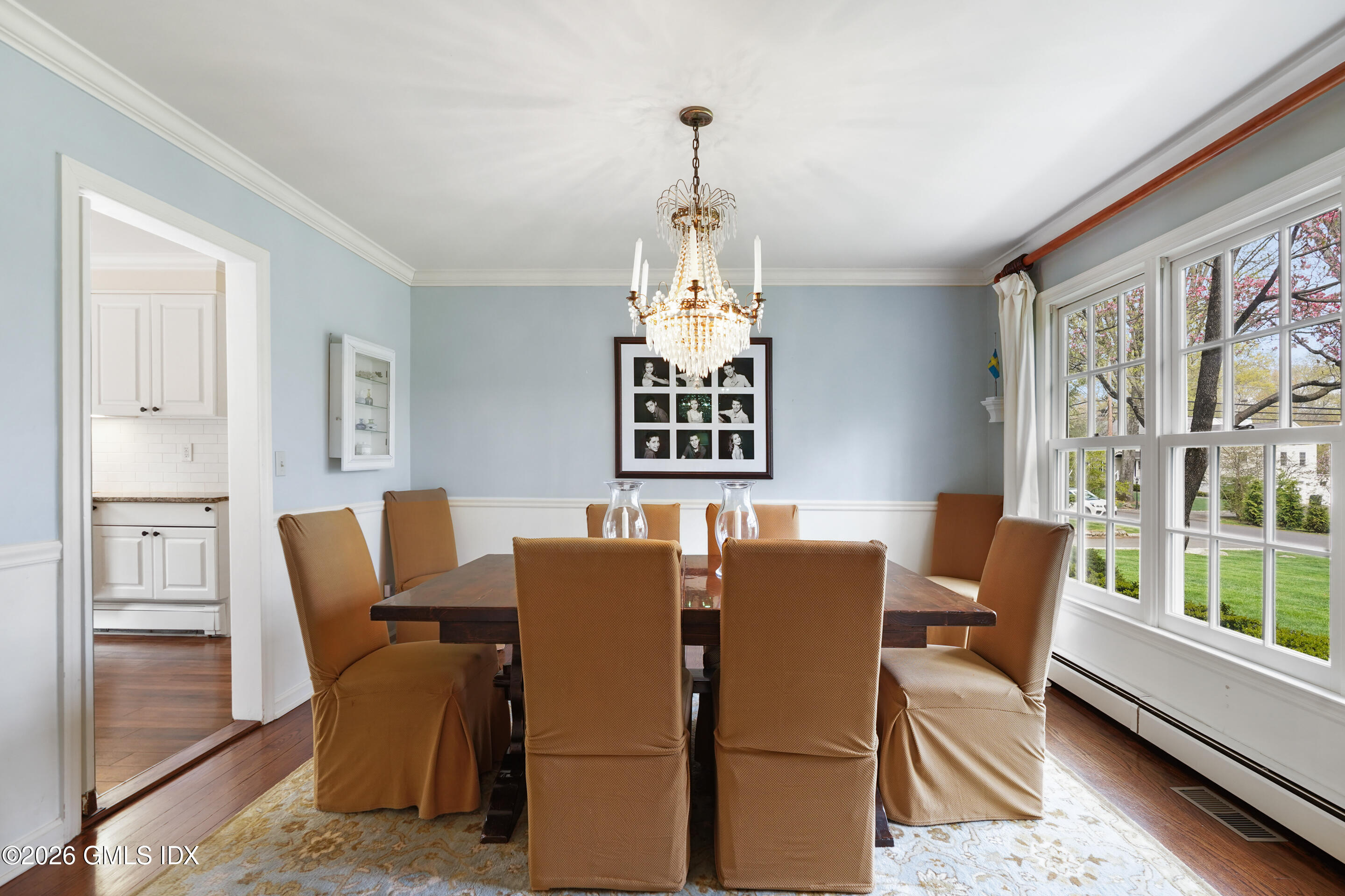 2 Daffodil Lane Cos Cob, CT 06807 - Photo 11 of 54 a view of a dining room with furniture window and wooden floor