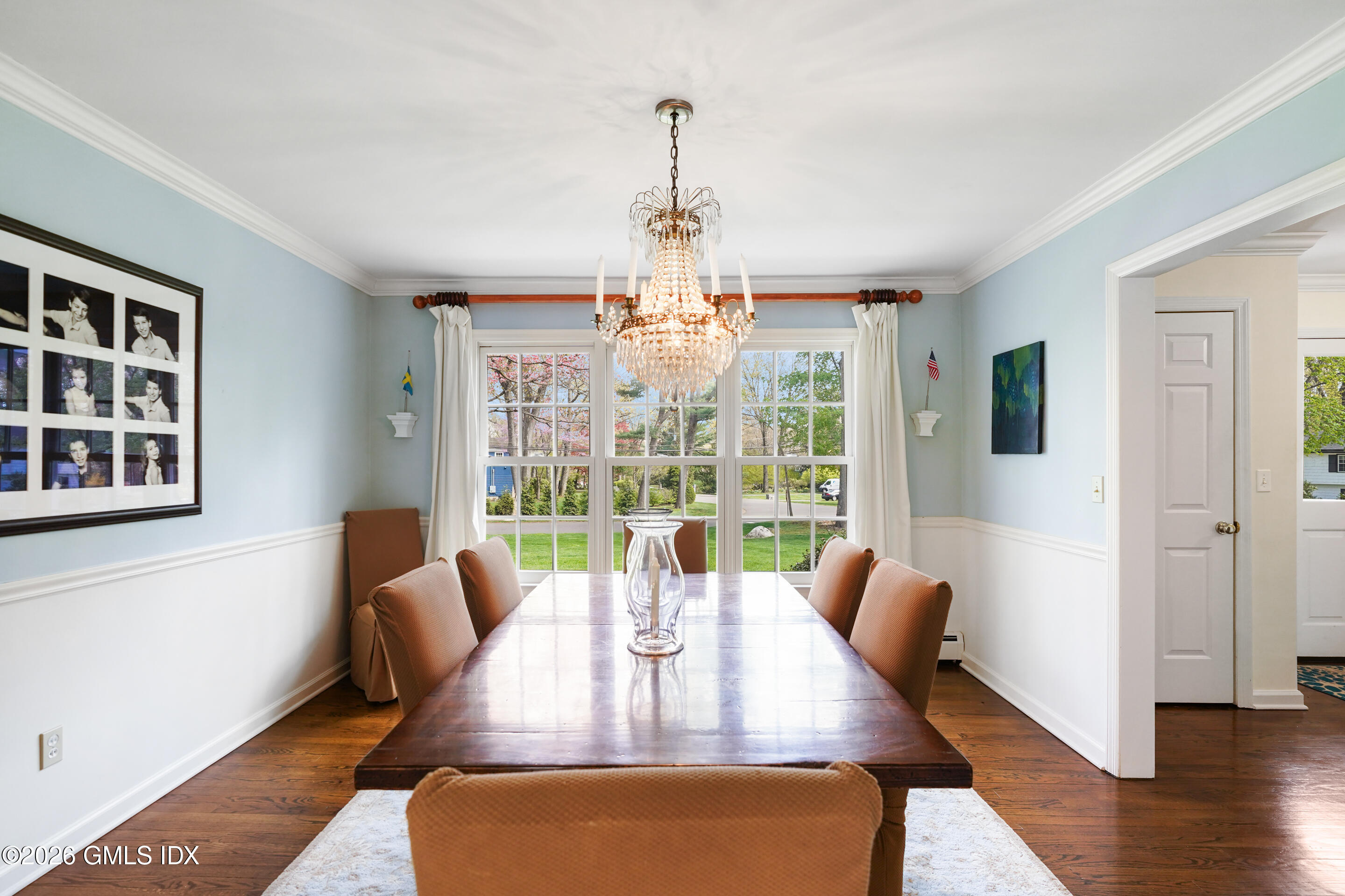 2 Daffodil Lane Cos Cob, CT 06807 - Photo 12 of 54 a view of a dining room with furniture wooden floor and chandelier