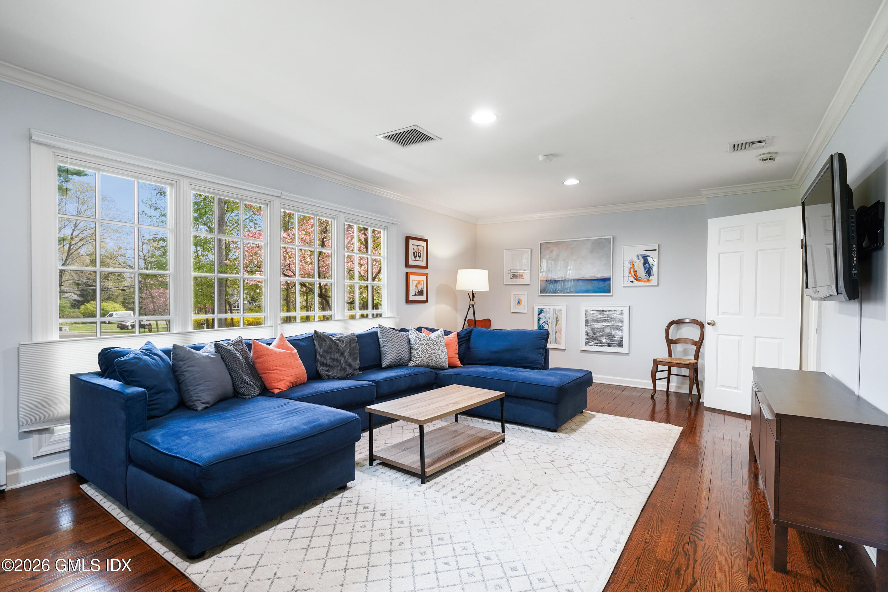 2 Daffodil Lane Cos Cob, CT 06807 - Photo 22 of 54 a living room with furniture and a flat screen tv