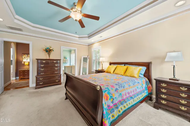 a bedroom with a bed and furniture