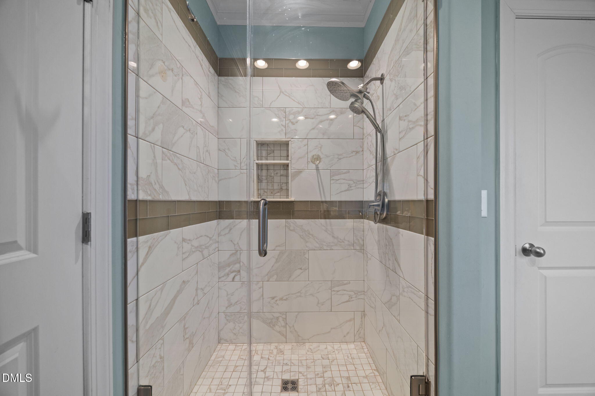 671 Whisper Ridge Drive Graham, NC 27253 - Photo 15 of 41 a bathroom with a glass shower door