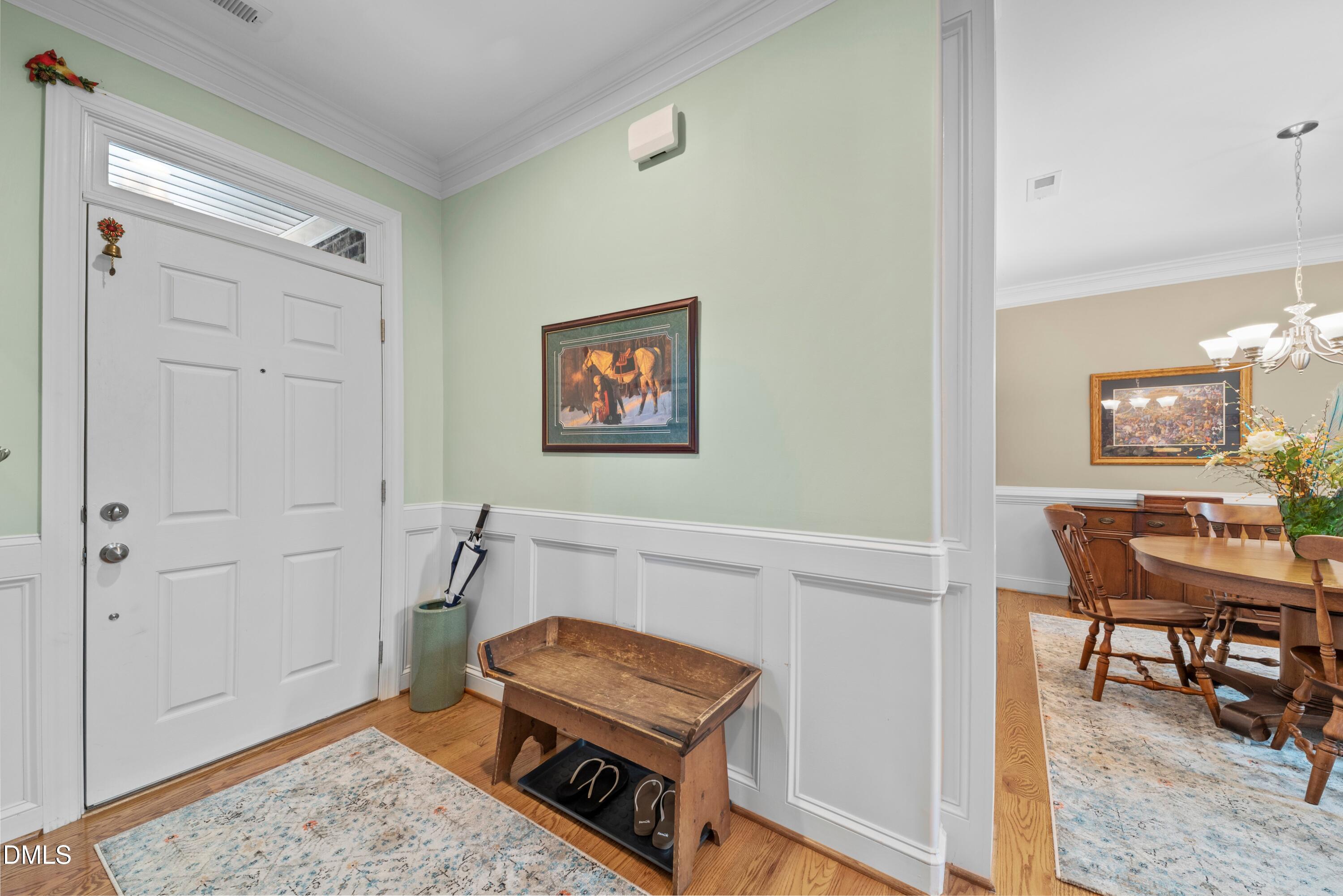 671 Whisper Ridge Drive Graham, NC 27253 - Photo 28 of 41 a living room with furniture and a rug