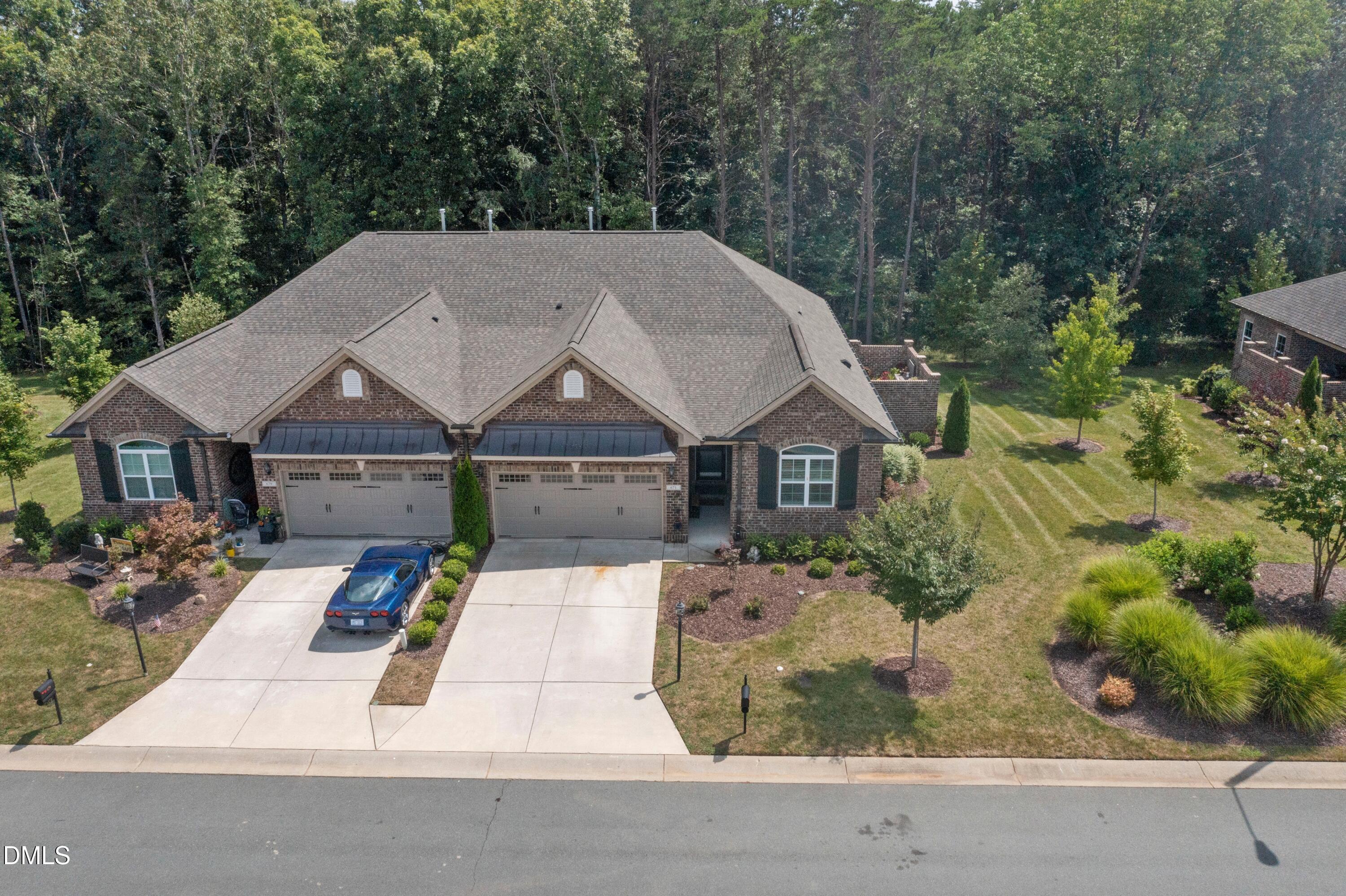 671 Whisper Ridge Drive Graham, NC 27253 - Photo 31 of 41 an aerial view of a house with swimming pool