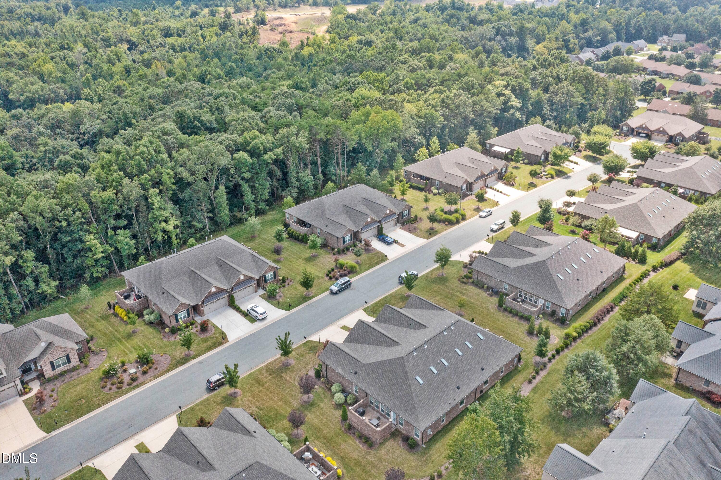 671 Whisper Ridge Drive Graham, NC 27253 - Photo 33 of 41 an aerial view of a house with a garden