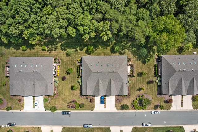 an aerial view of residential house with outdoor space