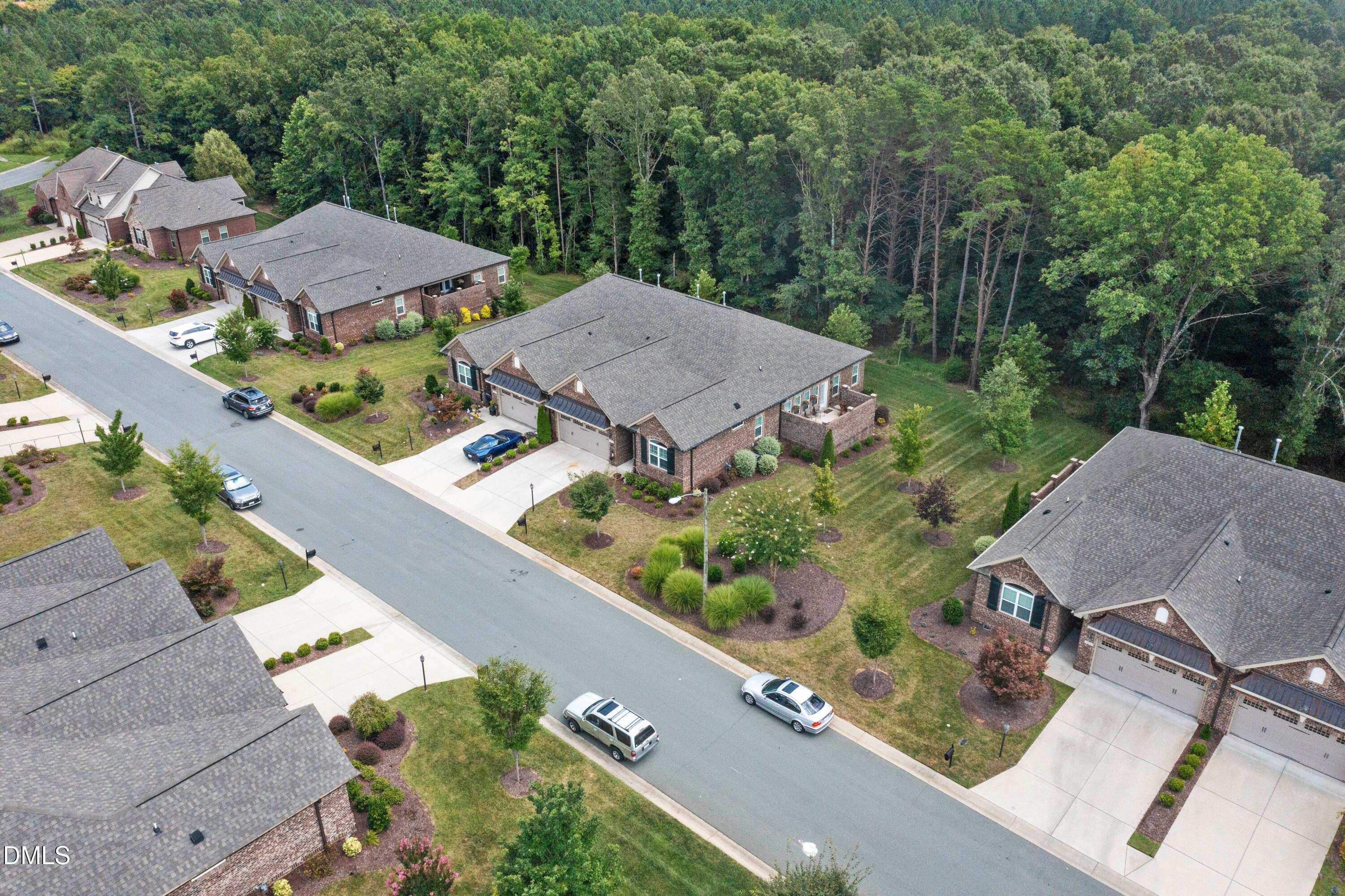 671 Whisper Ridge Drive Graham, NC 27253 - Photo 37 of 41 an aerial view of a house with garden space and street view