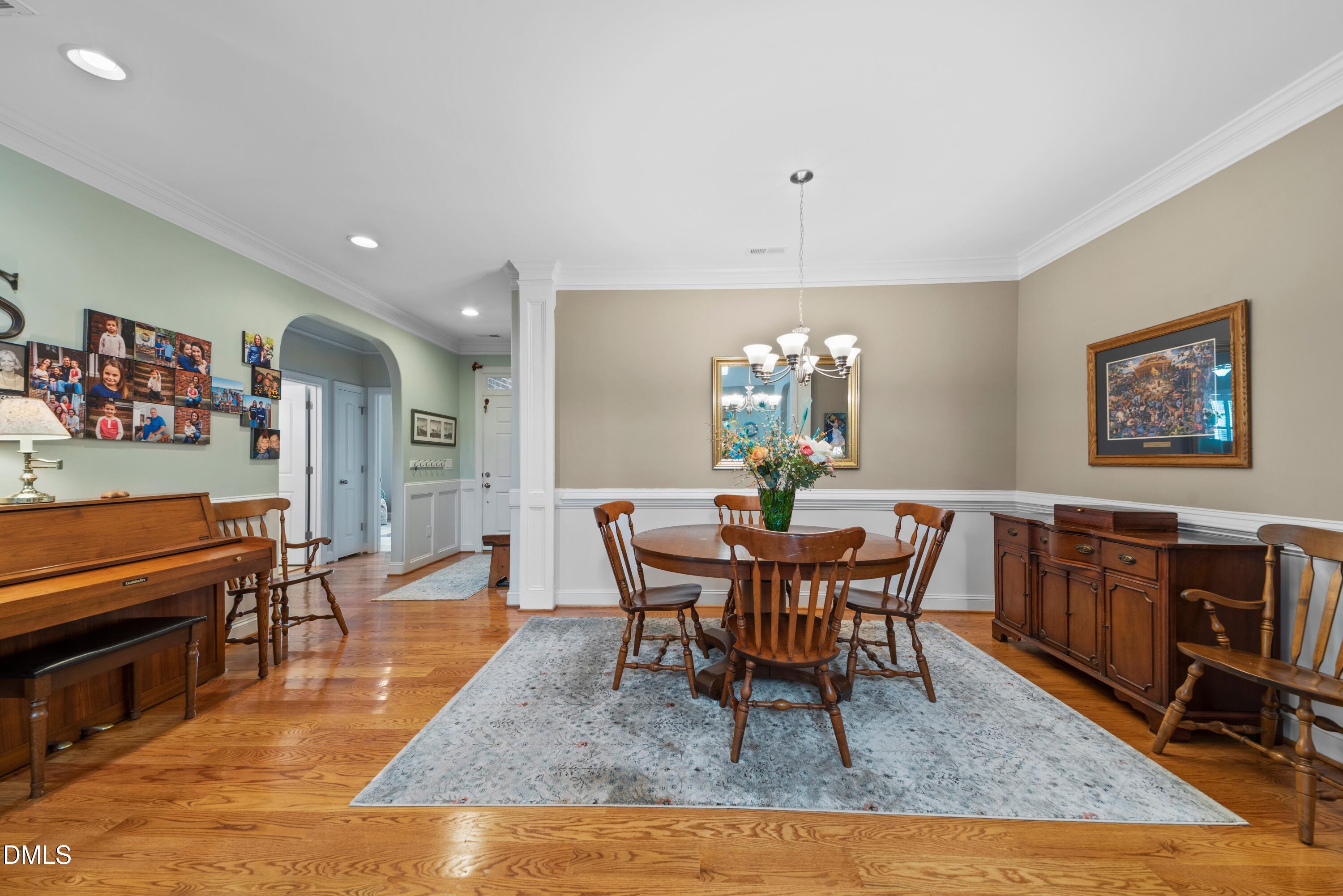 671 Whisper Ridge Drive Graham, NC 27253 - Photo 3 of 41 a view of a dining room with furniture
