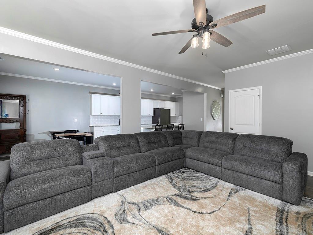 371 Highgrove Circle Dallas, GA 30157 - Photo 12 of 20 a living room with a couch and chandelier