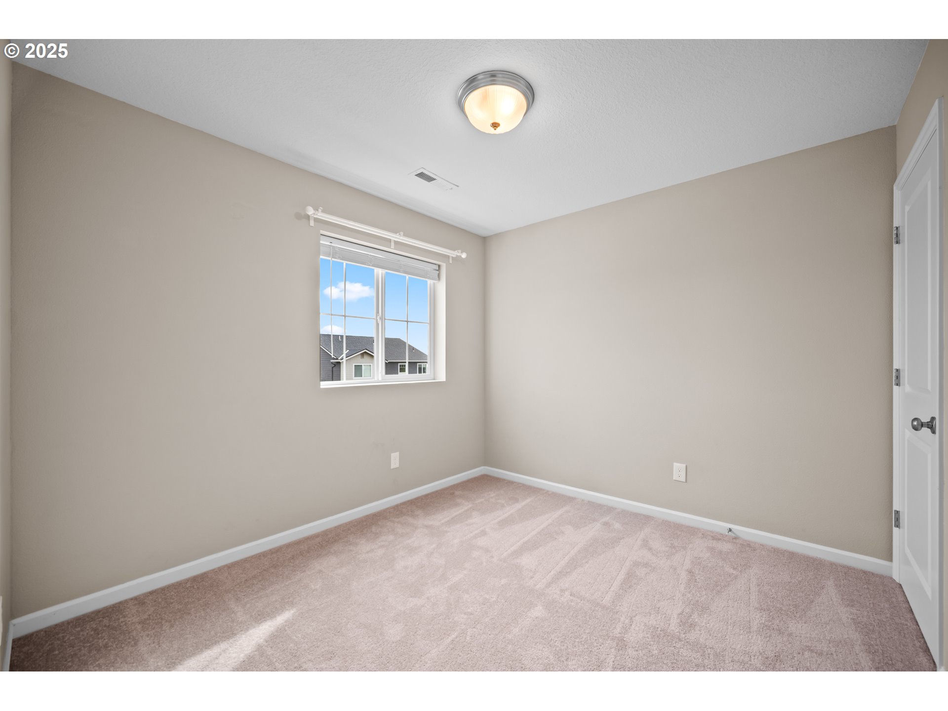 2777 South Red Tail Loop Ridgefield, WA 98642 - Photo 18 of 37 a view of an empty room with a window