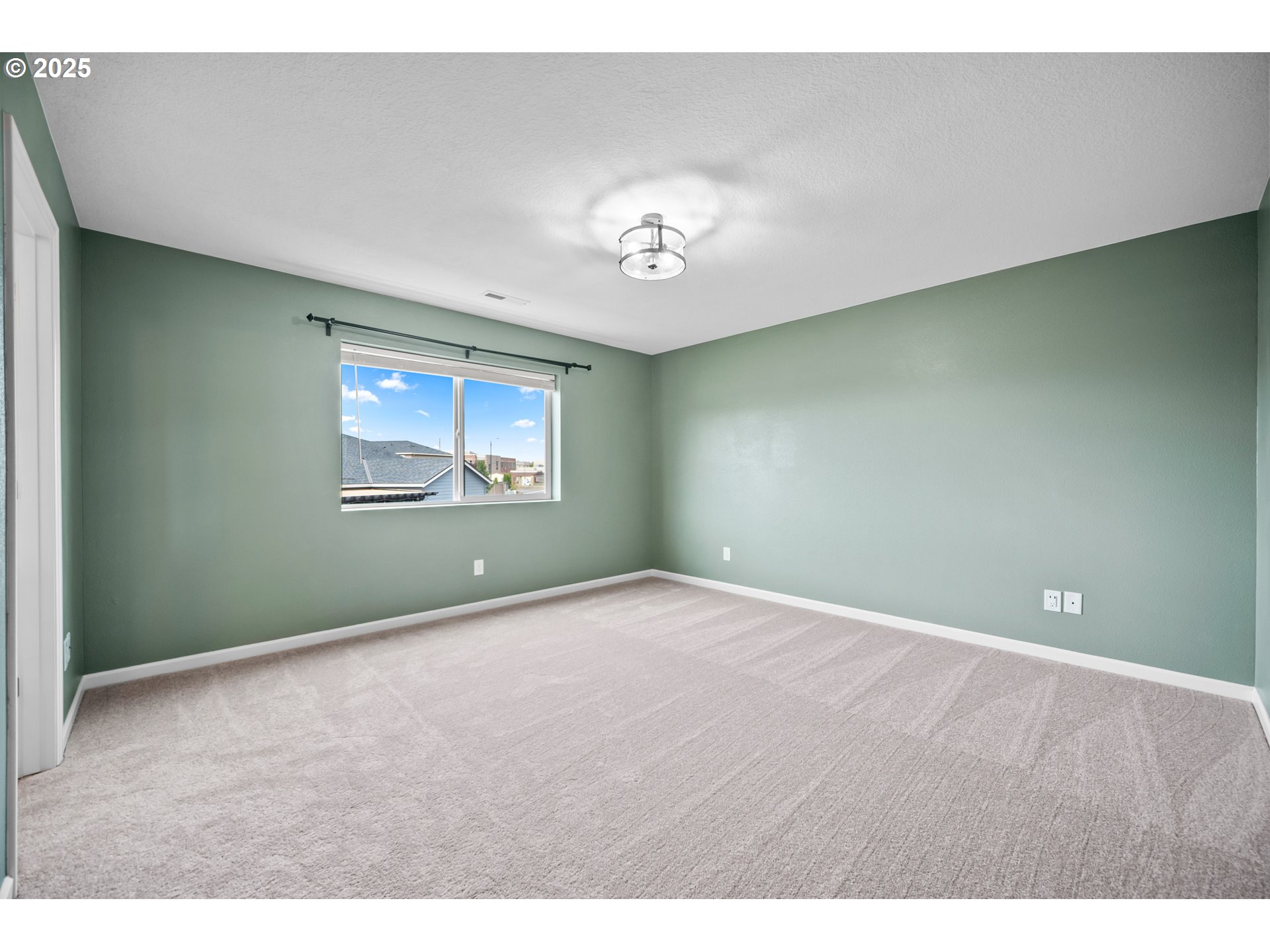 2777 South Red Tail Loop Ridgefield, WA 98642 - Photo 22 of 37 a view of an empty room with a window