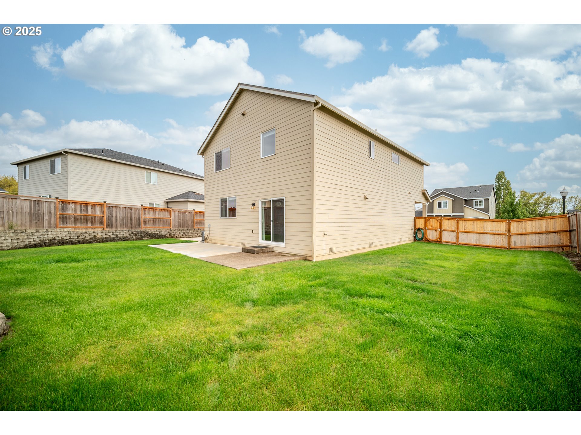 2777 South Red Tail Loop Ridgefield, WA 98642 - Photo 28 of 37 a view of an house with backyard space and garden